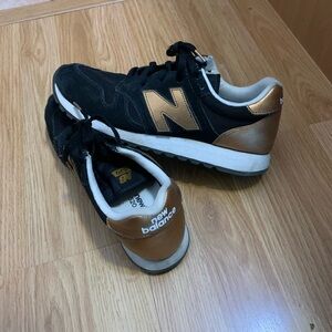 New Balance Black and Bronze Athletic Shoes size 10.